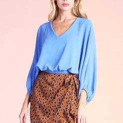 Tyche Clean Blue Textured Solid V-Neck Dolman Top