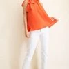Glam NEW ARRIVALS Coral Colored Tie Front Sleeveless Blouse
