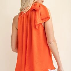 Glam NEW ARRIVALS Coral Colored Tie Front Sleeveless Blouse