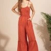 Very J Rust Colored Smocked Spotted Print Flare Jumpsuit
