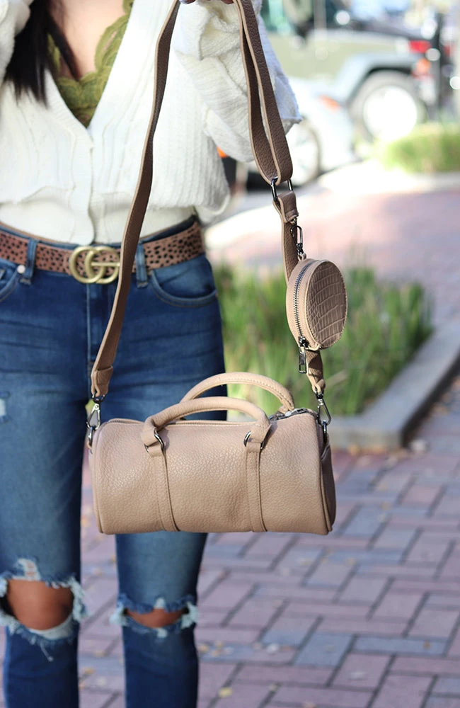 THE WEARHOUSE Cream Colored Tootsie Tube Bag NEW ARRIVALS 1 THE WEARHOUSE Cream Colored Tootsie Tube Bag NEW ARRIVALS