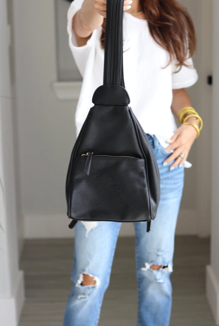 THE WEARHOUSE NEW ARRIVALS Black Zipper Strap Backpack 1 THE WEARHOUSE NEW ARRIVALS Black Zipper Strap Backpack